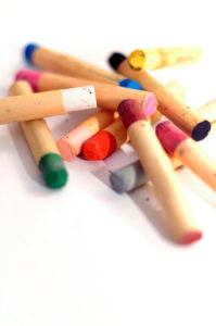 children crayon on a wahite paper